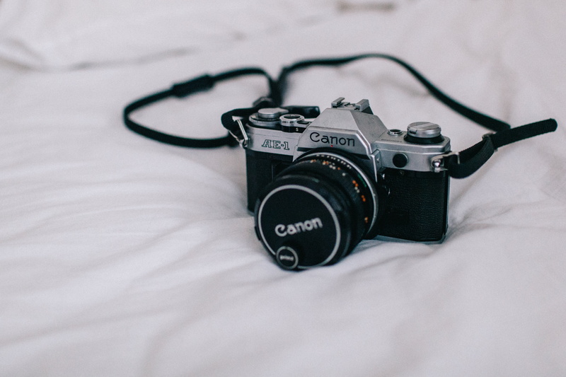 no people, text, old-fashioned, white, professional, technology, lens - optical instrument, single object, 35mm, close-up, film, canon, photography, still life