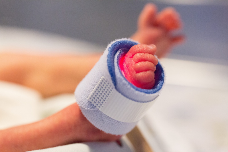 indoors, preemie, offspring, glove, foot, adult, winter, hand, fear, intensive, focus on foreground, suffering, human hand, infant, women, mouth open, holding