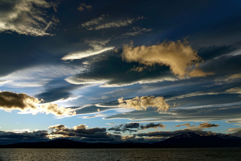south america, tranquil scene, fjord, landscape, dramatic sky, water, travel destinations, sea, cloud - sky, storm, bright, tranquility, clouds, puerto natales