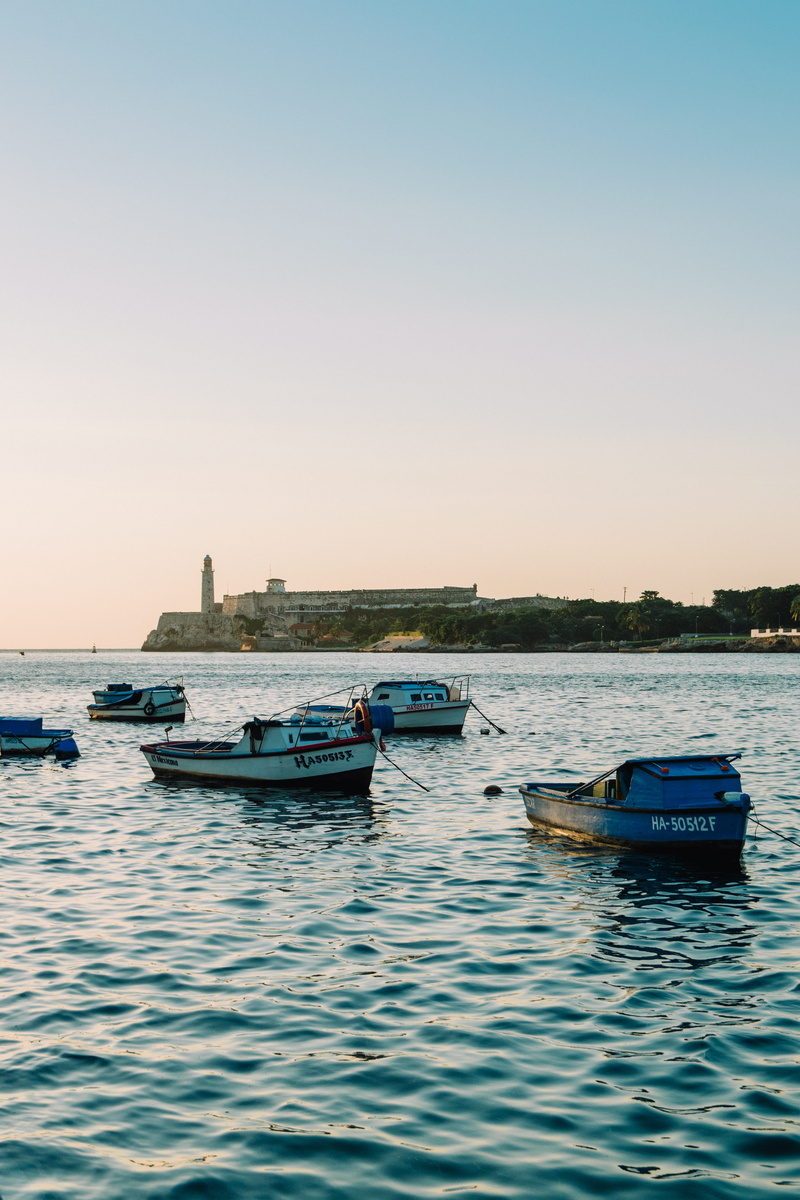 anchored, transportation, building exterior, scenics - nature, nature, mode of transportation, havana, architecture, calm, water, sunset, boats, cuba, sky