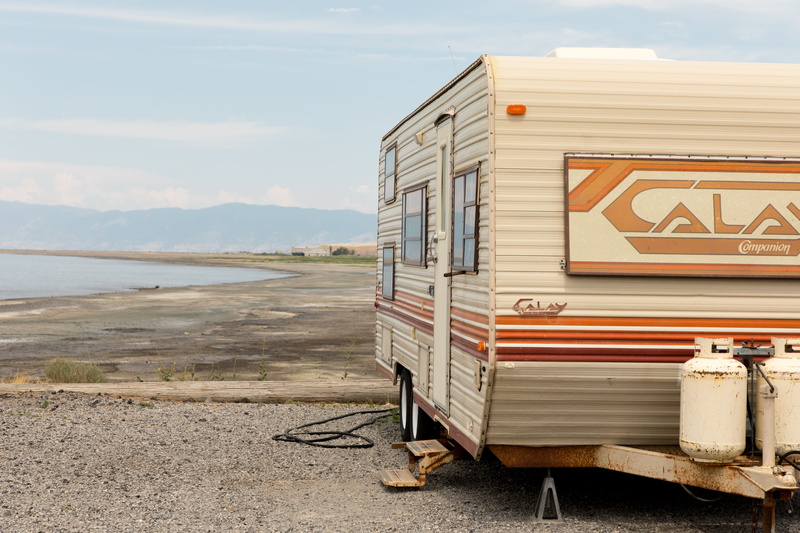 western script, mobile home, nature, long sleeve, 5K, car, land, plywood, clothing, building, basin, rv, outdoors, van, apparel, day, metal, sleeve, sign