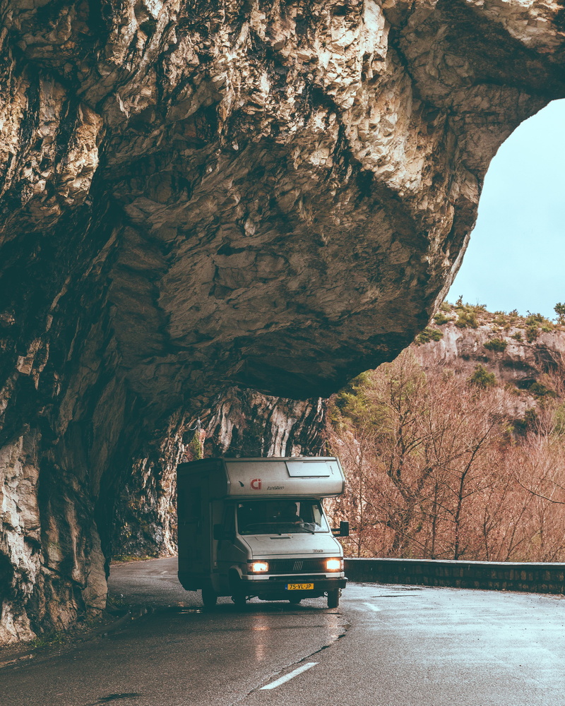 transportation, van, basin, rock, outdoors, truck, rock - object, ocean, day, shoreline, rock formation, sea, road, beauty in nature, travel, cliff, coast