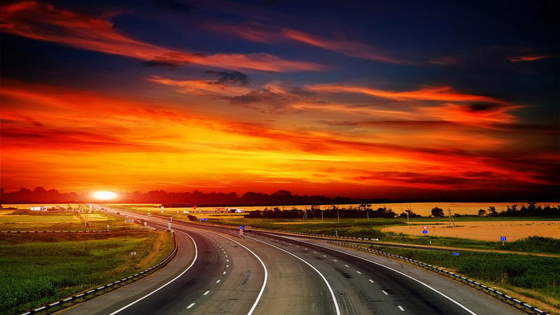 outdoors, transport, clouds, sunset, speed, direction, hill, freeway, transportation, highway, dusk, sky, street, multiple lane highway, way, city, cloud