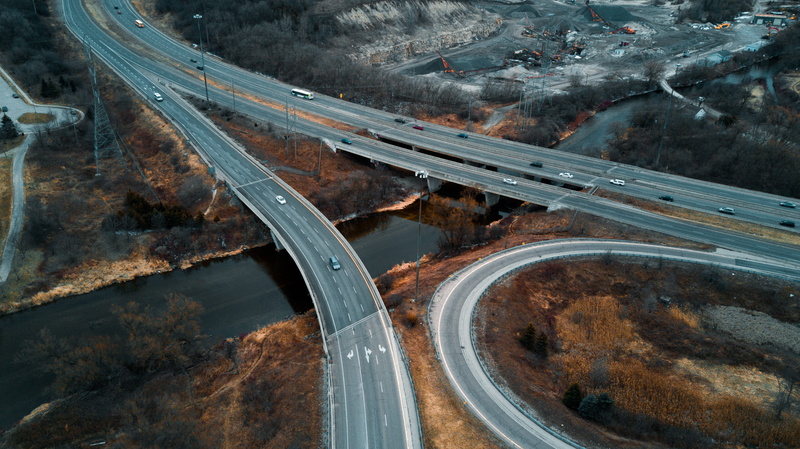 high angle view, elevated road, motor vehicle, highway, no people, car, freeway, transportation, aerial, vehicle, nature, bridge - man made structure, outdoors