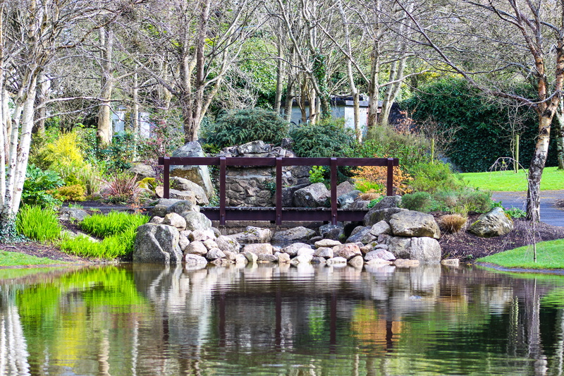 creek, bog, outdoors, furniture, bridge, waterfront, water, land, marsh, reflection, lake, plant, tree, bench, villa, housing, nature, solid, stream, arbour