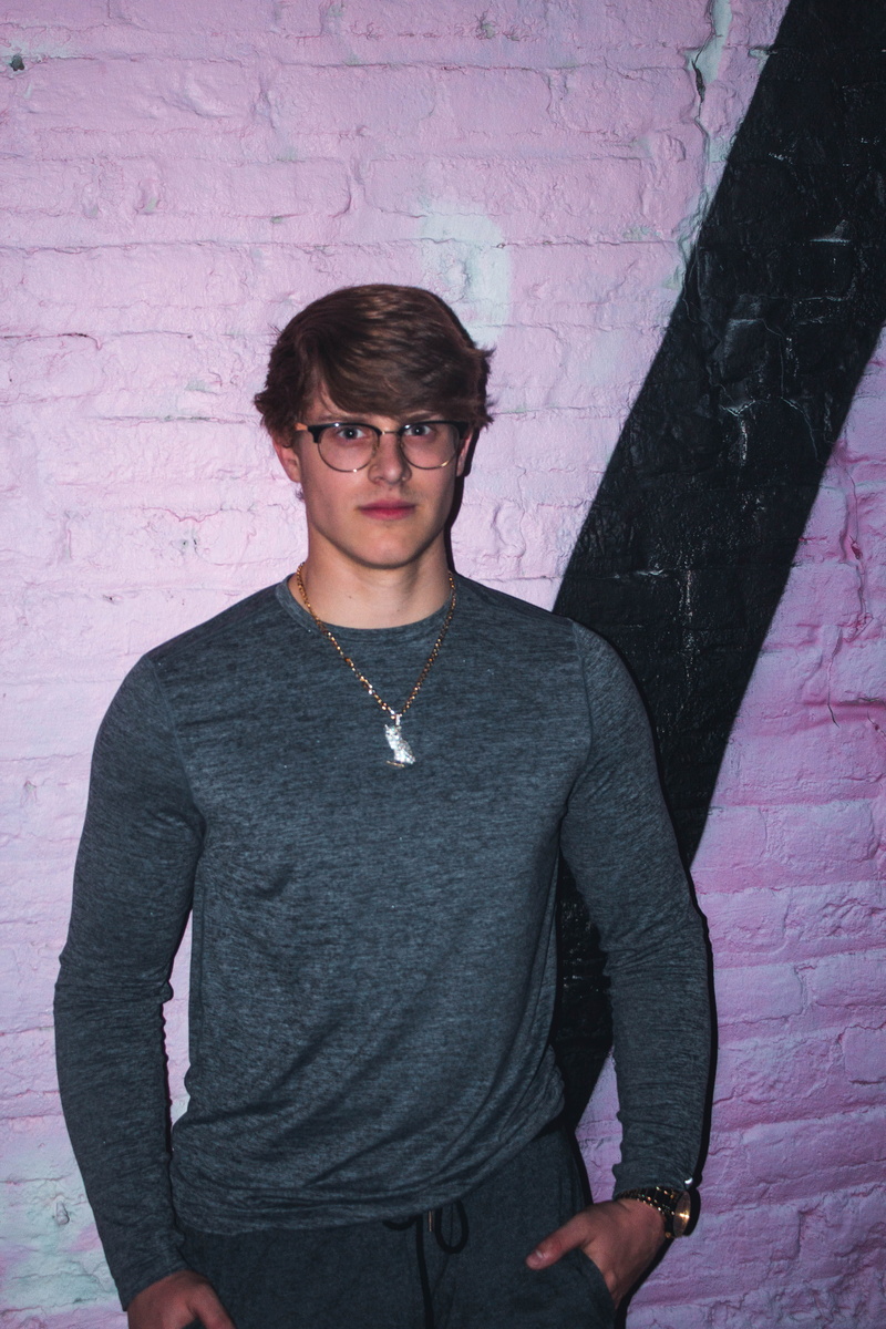 casual clothing, fine-looking, man, shirt, front view, s, sweater, wall - building feature, human, person, face, men, one person, portrait, close-up, wear