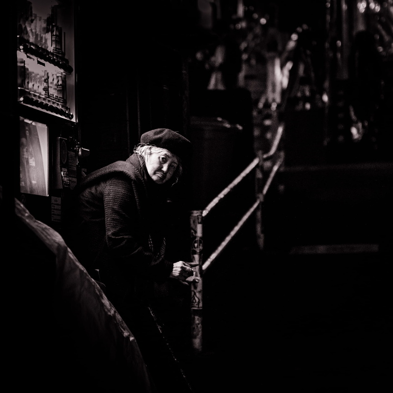 longsleeves, alone, night, black, looking at camera, men, lady, hood, side view, person, one person, standing, casual clothing, wear, built structure, architecture