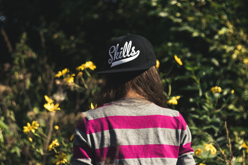 flowers, plants, day, casual clothing, black, focus on foreground, wear, skill, fall, recreation, bokeh, portrait, sunlight, one person, rear view, printed