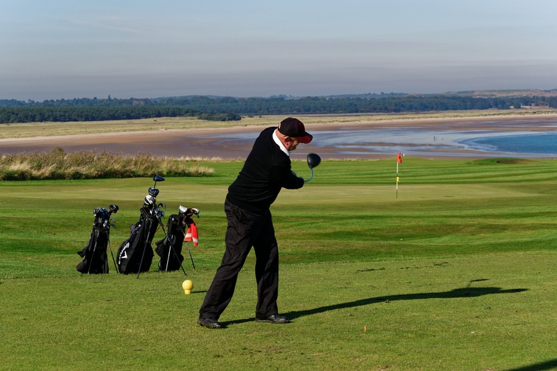 landscape, golf swing, golf buggy, activity, green - golf course, golf, player, sea, one person, full length, course, golf club, recreation, swinging, active