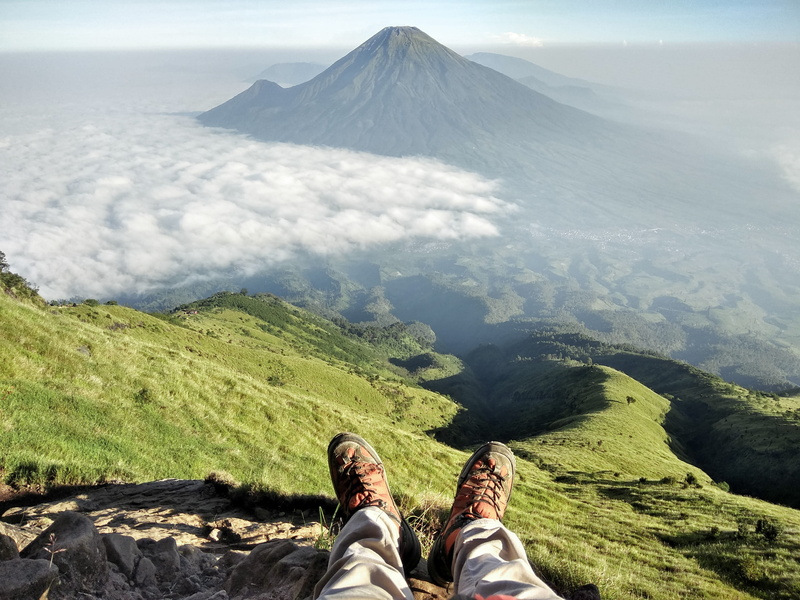 beauty in nature, mountain, low section, tranquility, lifestyles, real people, shoe, environment, human leg, personal perspective, outdoors, nature, tranquil scene
