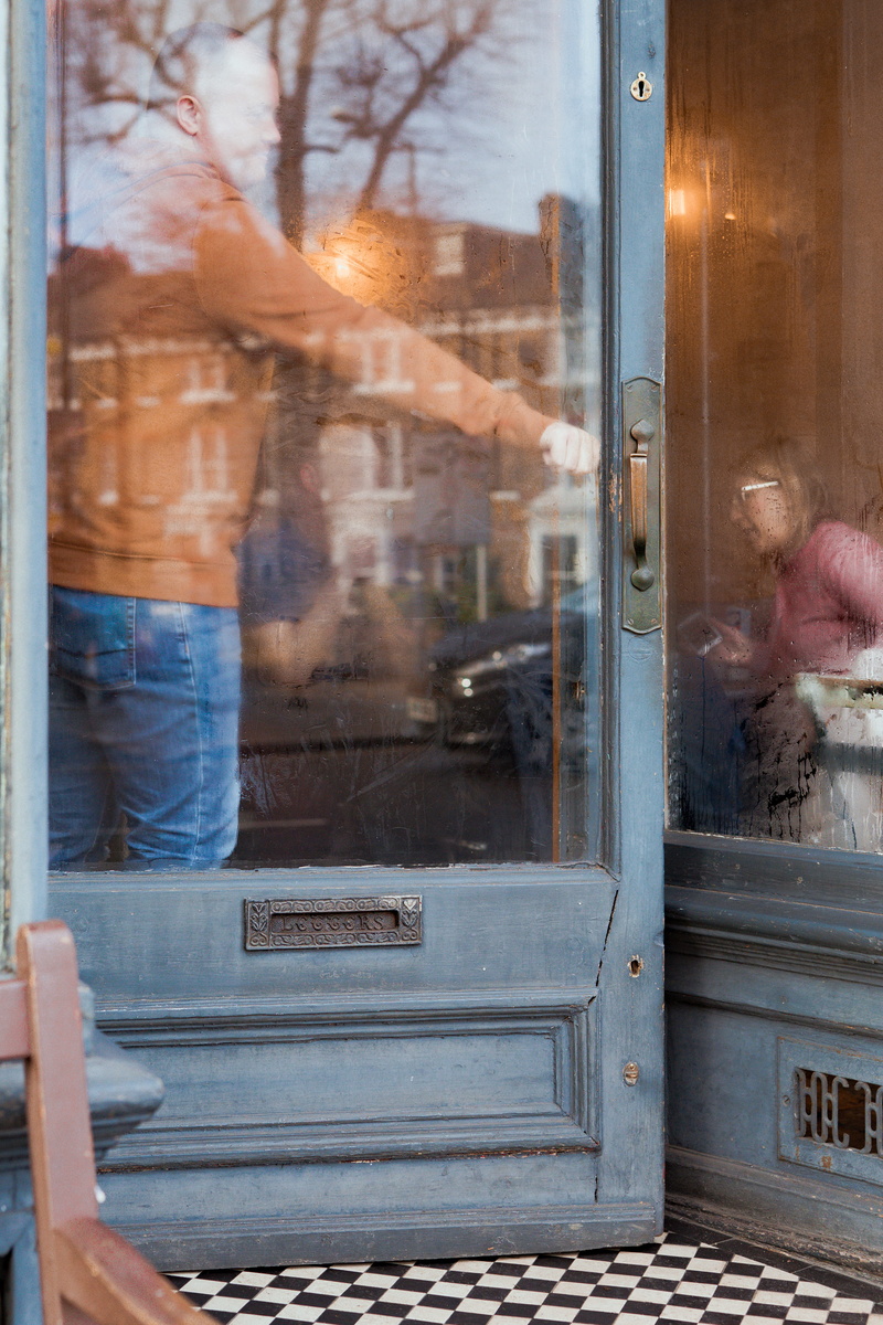 pants, fashion, glass - material, flooring, real people, incidental people, nature, transportation, door, mode of transportation, shop, travel, window