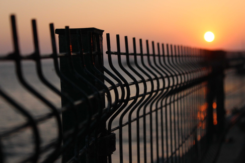 water, sky, reflection, sunset, selective focus, atmosphere, romantic, blue, rest, boundary, twilight, sun, atmospheric, protection, wire, wire mesh, dusk