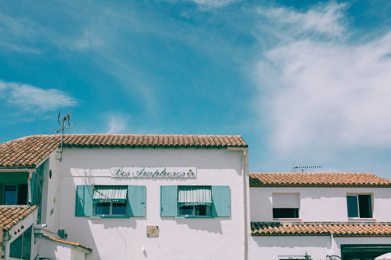 country, canon, window, text, communication, roof, cloud - sky, residential district, roofs, film, day, bright, no people, building, city, copy space, 35mm
