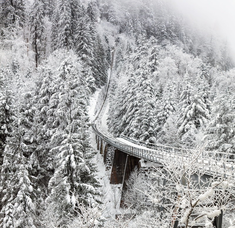 winter, schwyz, outdoors, wintertime, travel, mountain, 2K, tranquility, cliff, european, curve, viaduct, growth, built structure, snow, europe, beauty in nature