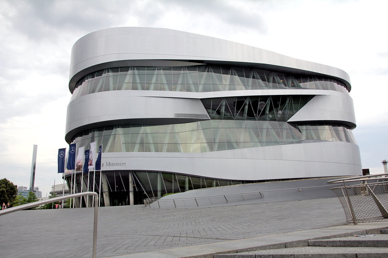city, low angle view, built structure, office building exterior, mercedes-benz museum, glass - material, germany, building exterior, mercedes, steel, outdoors