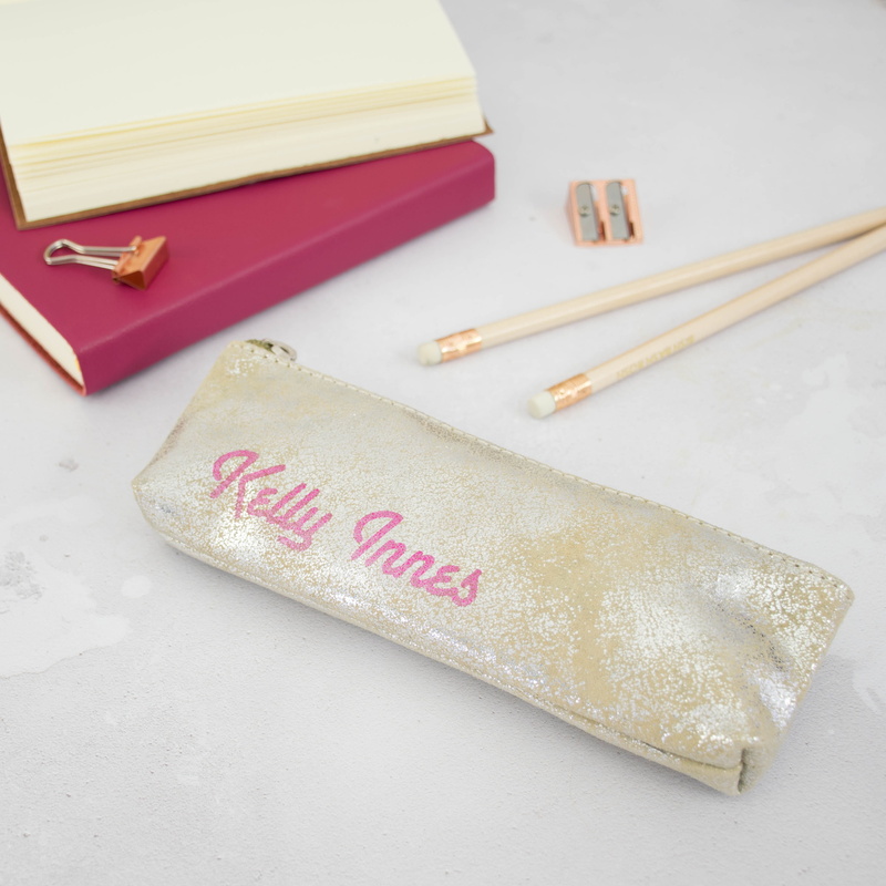 high angle view, close-up, writing instrument, indoors, gift, table, education, creative, eraser, creativity, text, communication, rubber, art and craft
