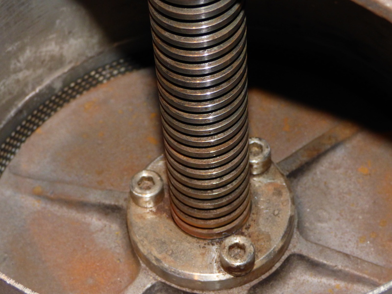 connection, backgrounds, spiral, nut - fastener, no people, bolt, coiled spring, technology, indoors, thread, the industry, alloy, steel, finance, vice