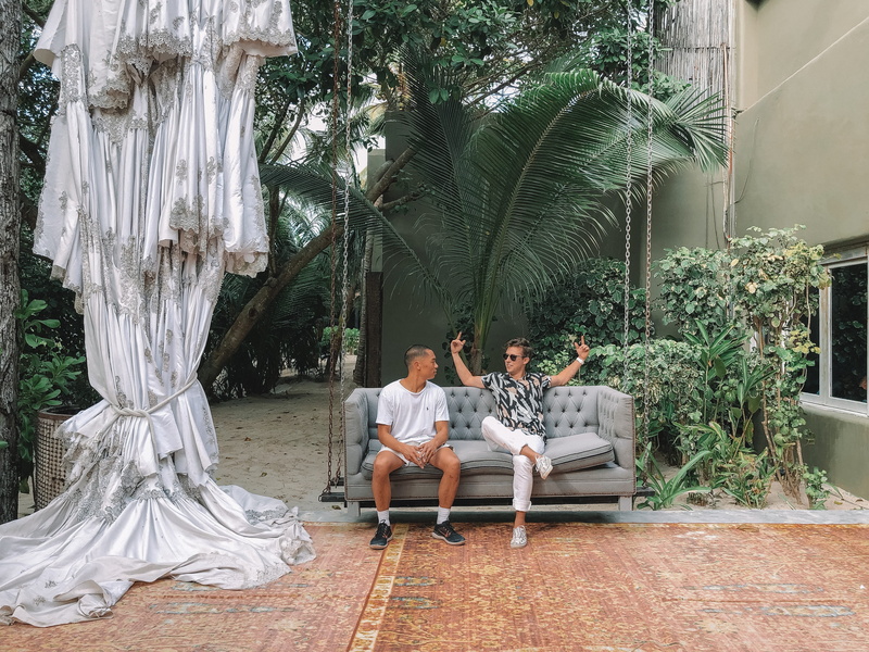 living room, tree, flagstone, room, full length, sitting, footwear, real people, sofa, clothing, nature, women, men, digital nomads, adult, plant, swing