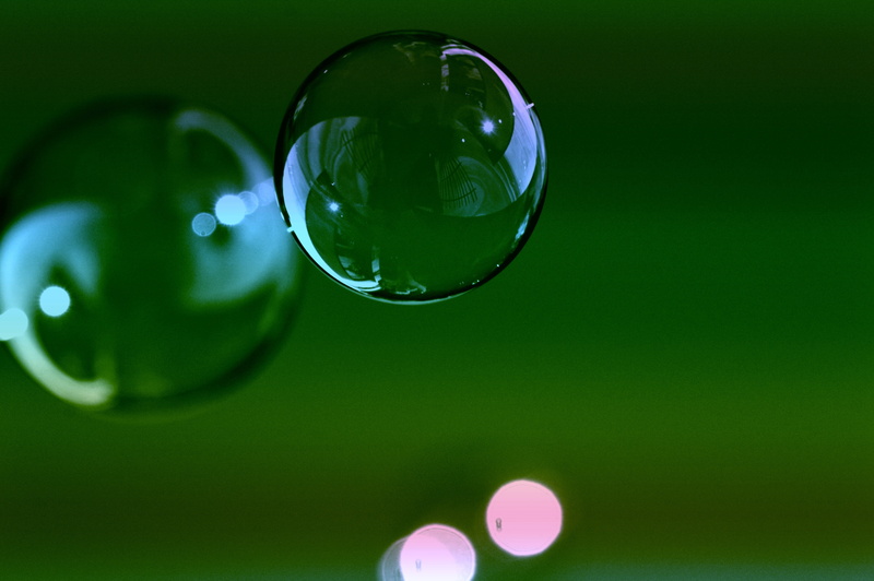 green Color, fragility, colorful, no people, close-up, reflection, glass, mirroring, indoors, transparent, glass - material, drop, clear, ball, shape, focus on foreground
