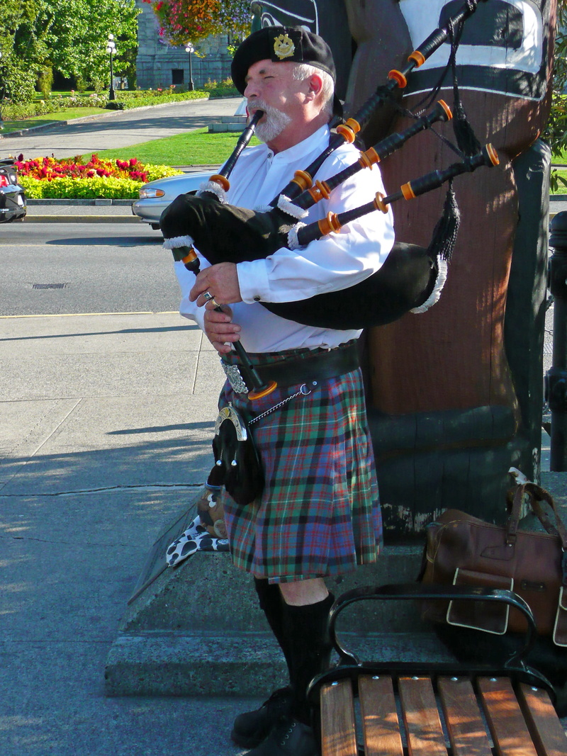 arts culture and entertainment, street, Scottish, british columbia, Bagpiper, musician, standing, side view, full length, playing, holding, city, real people