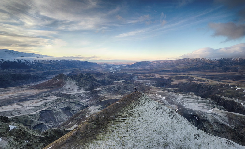 mountainscape, slope, sky, mountain peak, outdoors, remote, person, physical geography, grey, extreme terrain, 5K, peak, wilderness, iceland, valley, aerial view