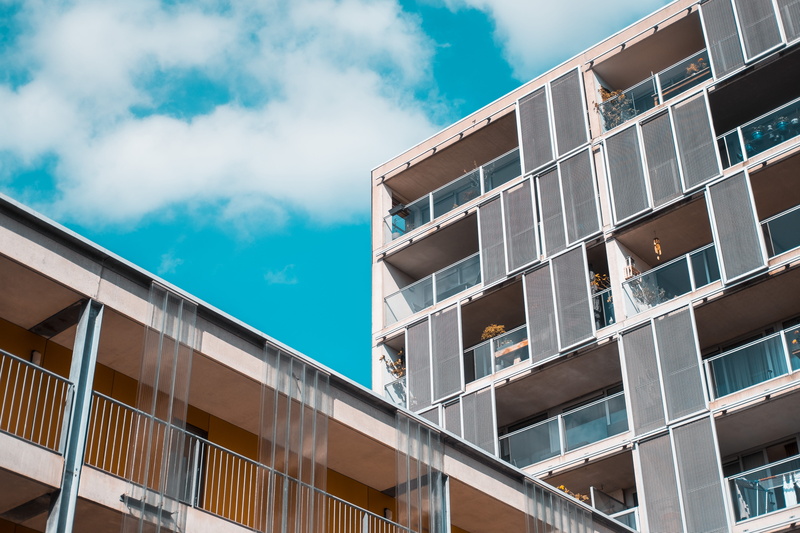 breda, railing, residential district, cloudy, town, glass - material, balcony, building, window, day, condo, sunlight, banister, handrail, built structure