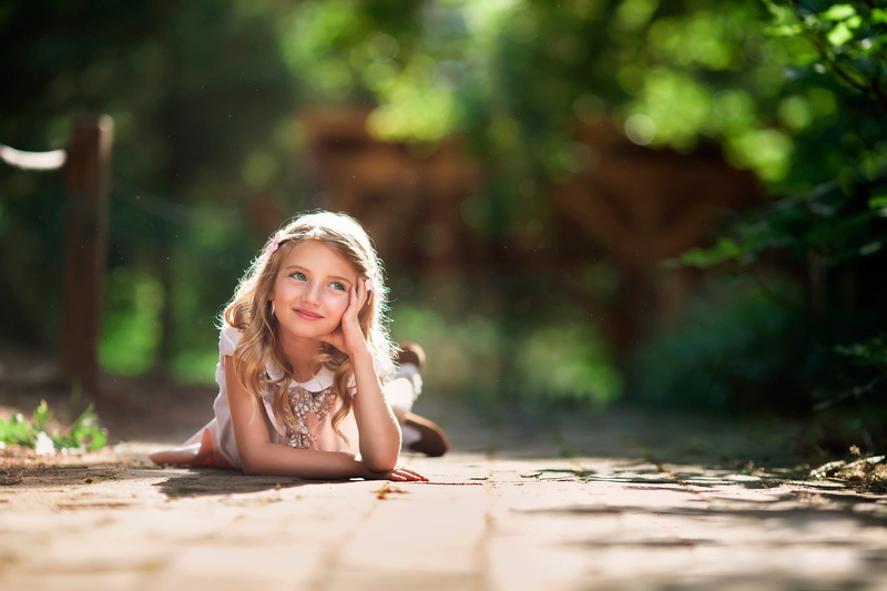 offspring, sitting, hair, selective focus, leisure activity, bokeh, females, the sun, smiling, portrait, girl, front view, child photography, girls, one person