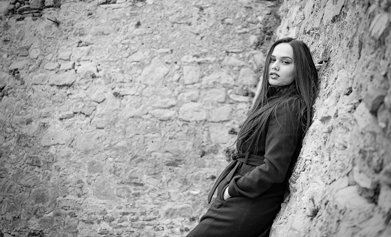 women, face, italian, outdoors, castellabate, wall - building feature, standing, eyes, leather, hair, young adult, stone wall, wall, brick, photo, field