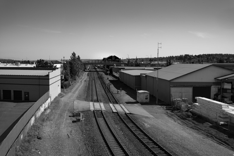 built structure, building exterior, direction, industrial, mt rainier, sky, building, public transportation, architecture, city, train tracks, day, train station