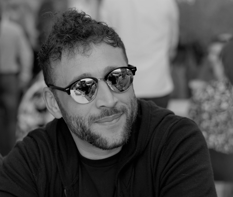 young men, urban, gaze, modern, beard, person, thinking, smile, sunglasses, stare, lifestyles, casual clothing, focus on foreground, fashion, man, pensive