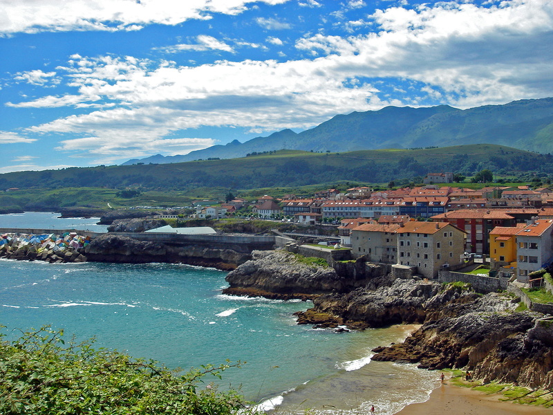 llanes, architecture, building, sea, mountain range, building exterior, sky, outdoors, built structure, cloud - sky, high angle view, scenics - nature