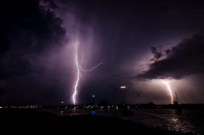 outdoors, night, no people, lightning, dark, lightning bolt, storm, cityscape, aggression, water, warning sign, 2K, dramatic sky, cloud - sky, communication