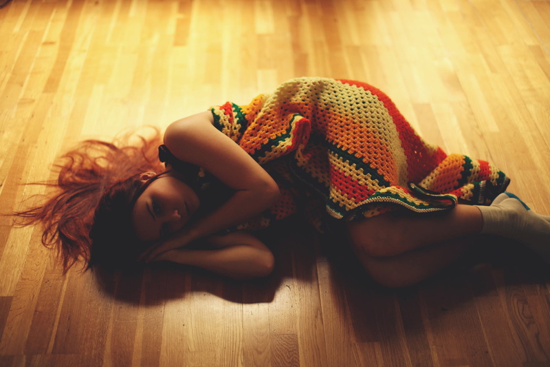 lying on back, furniture, dress, young adult, s, socks, girl, lifestyles, floor, hardwood floor, plaid, laminate, full length, home interior, multicolored