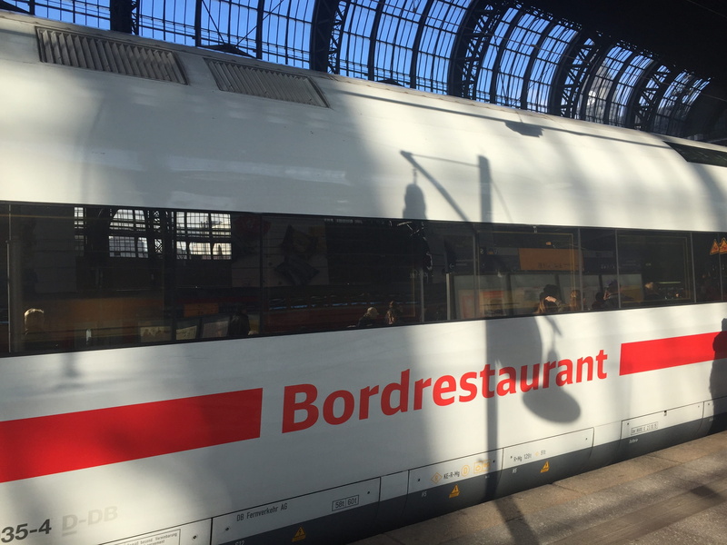 western script, indoors, train, station, hamburg, built structure, restaurant, subway, central station, ice, 2K, transportation, communication, dining car