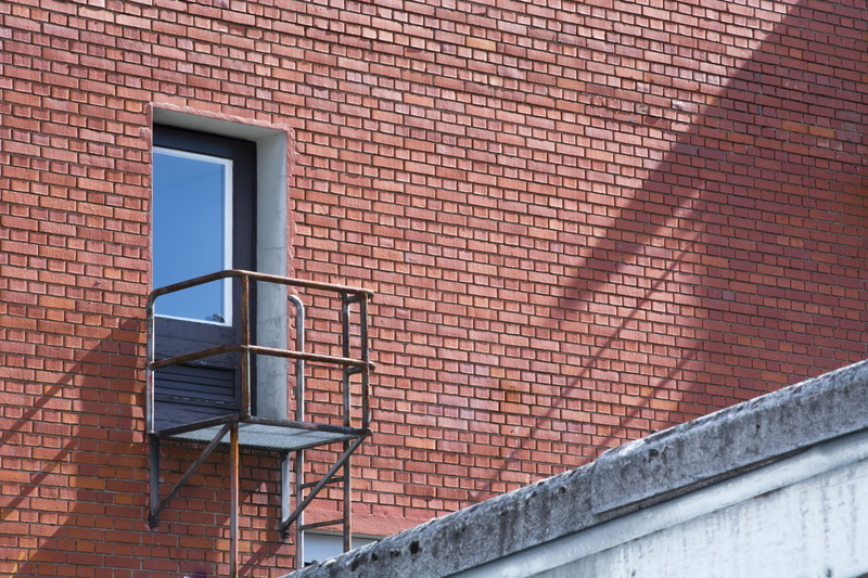 safety, building exterior, architecture, wall, building, staircase, dreispitz, no people, outdoors, sunlight, brick wall, railing, front, window, switzerland