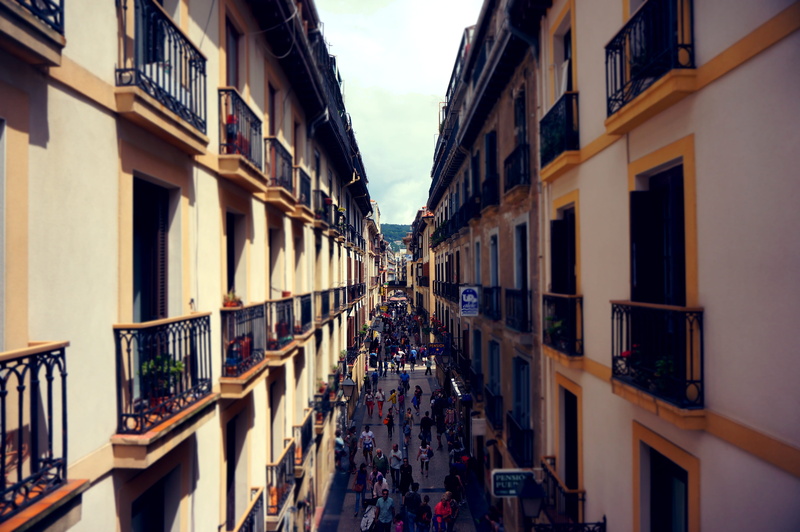 france, walking, side by side, apartments, town, city life, day, people, group of people, pedestrians, street, in a row, incidental people, balconies, windows