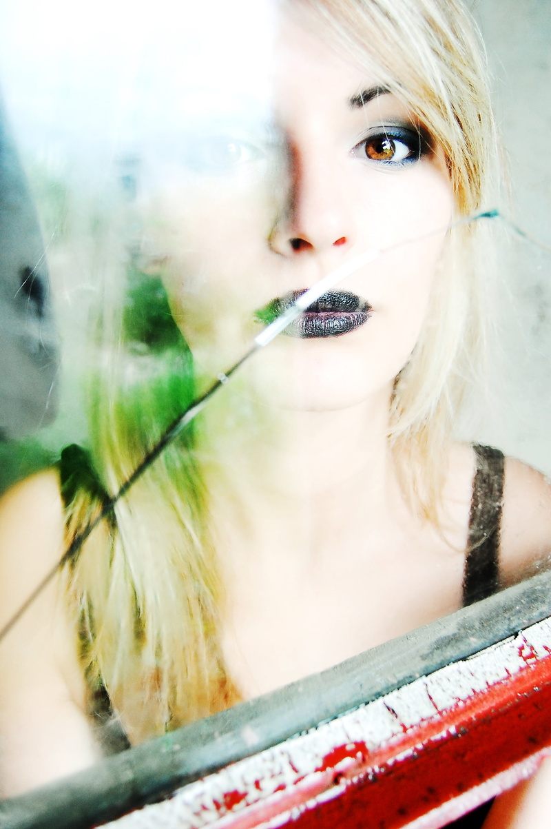 day, the black lips, make-up, contemplation, woman, human lips, spaghetti, hairstyle, looking at camera, 2K, real people, hair, portrait, black, sad, wonat