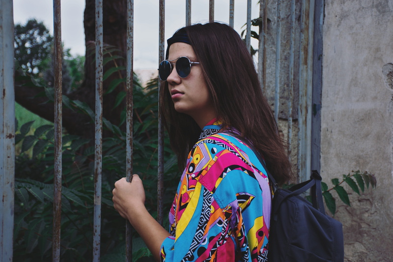 hippie, leisure activity, girl, darkness, women, long hair, kånken, glasses, red, rails, real people, hair, yellow, sunglasses, side view, lifestyles, metal