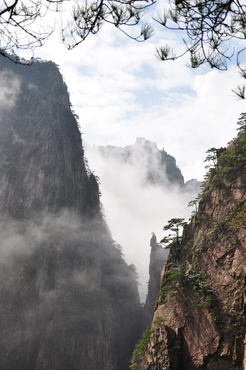 the scenery, outdoors, black and white, sky, nature, rock, huangshan, travel, rock - object, cloud sea, mountain peak, 2K, natural, mountain, clouds, tourism