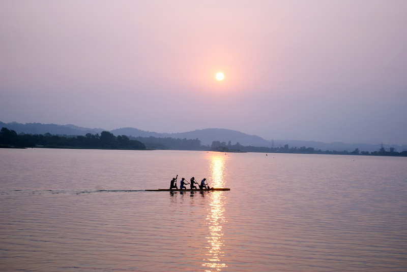 beach, water, rowing, beauty in nature, group of people, transportation, sky, rowboat, sport rowing, sunset, tranquil scene, mountain, scenics - nature