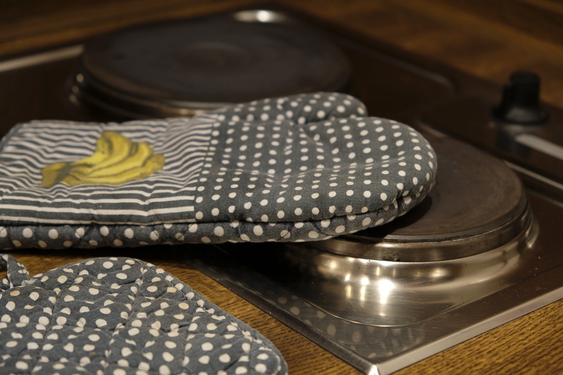 kitchen, wealth, oven mitts, cook, high angle view, close-up, indoors, selective focus, electric cooker, glove, art and craft, ornate, kitchen utensil