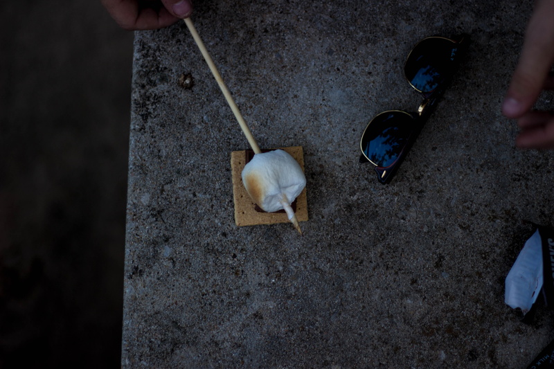 one person, lifestyles, real people, human finger, human body part, high angle view, love, finger, day, marshmallows, trip, holding, outdoors, marshmellow