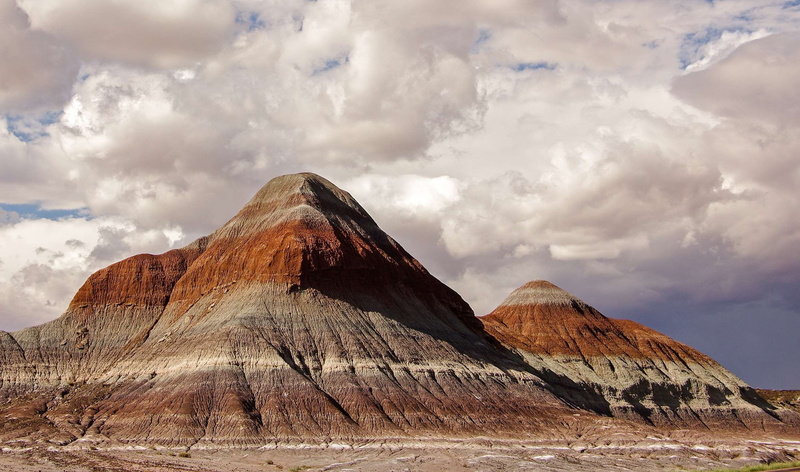 clouds, non-urban scene, mountain range, national park, tranquil scene, petrified forest, tepees, arid climate, travel destinations, environment, mountain peak
