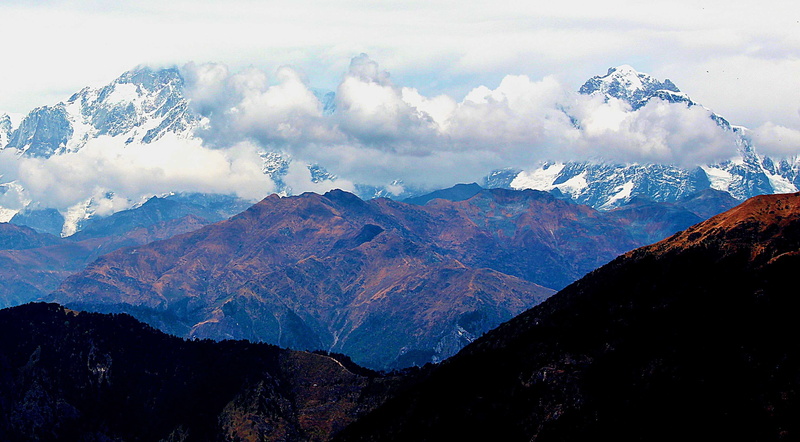 snow, tranquility, environment, mountain range, travel destinations, sky, snowcapped mountain, peak, mountain peak, viewpoint, highlands, landscape, cloud - sky