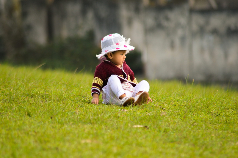front view, 2K, child, childhood, cuteness, plant, cute, leisure activity, selective focus, sitting, shillong, polo ground no. 5, one person, newborn