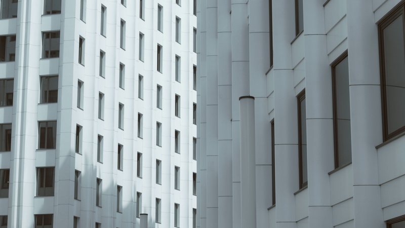 white color, megalopolis, summer, low angle view, buildings, building Exterior, blue sky, full frame, city, sky, wall, house, office, street, daytime, window