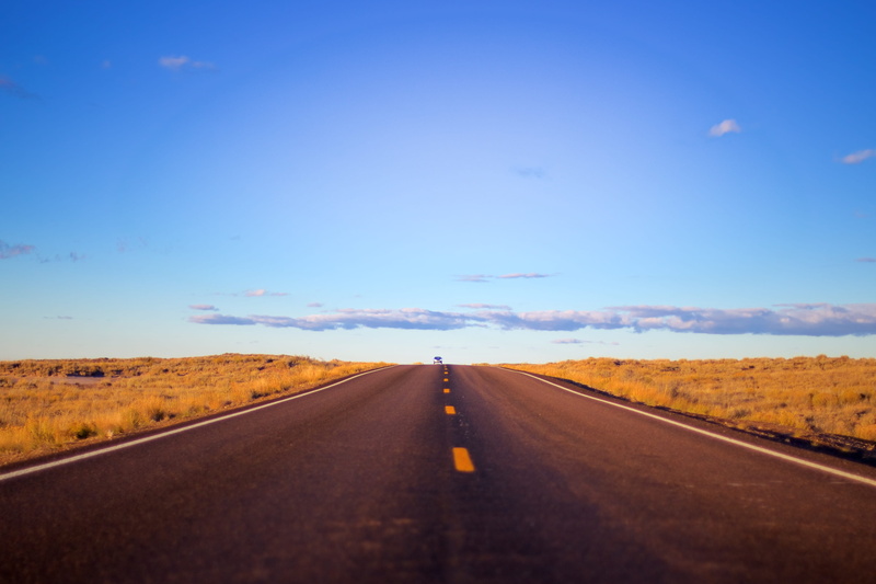 painted desert national park, transportation, road, painted desert, sky, vanishing point, tranquil scene, outdoors, sign, 4K, road marking, petrified forest national park