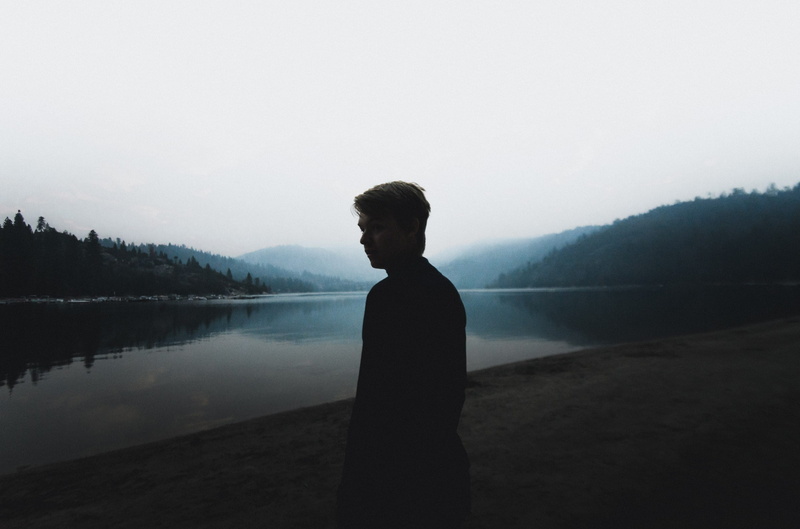 back view, fog, haze, real people, tranquility, beauty in nature, sky, male, scenic, trees, nature, contemplation, looking at view, non-urban scene, person