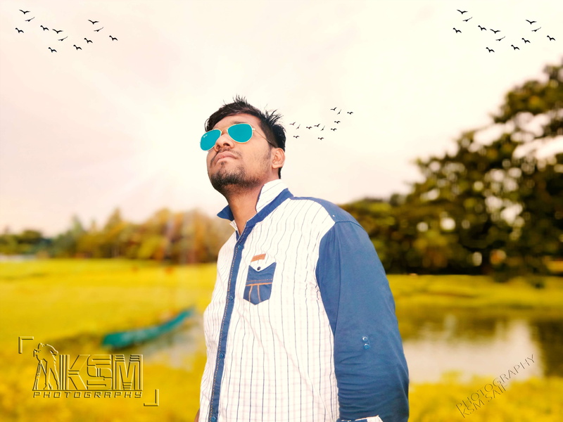 leisure activity, facial hair, glasses, young adult, water, nature, one person, outdoors, fashion, sunglasses, waist up, young men, designer ksm saif, real people