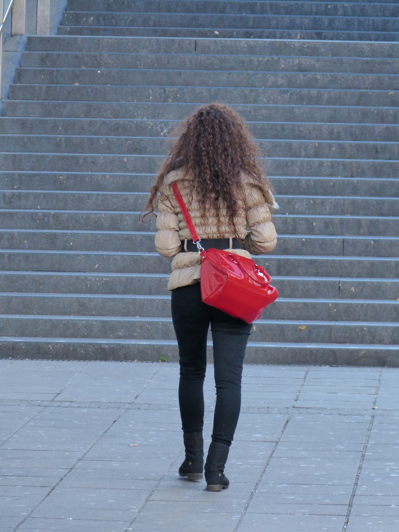 patent, lifestyles, obscured face, paving stone, full length, casual clothing, young Adult, Hair, adult, street, red, leisure activity, females, carrying